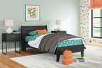Black panel platform bed with colorful bedding and white pillow