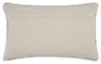 Light beige fabric pillow with smooth surface and subtle stitched edge