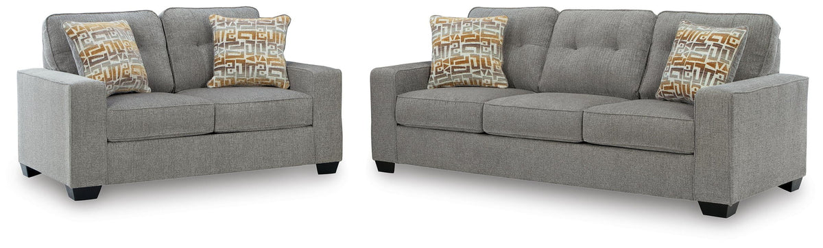 Gray fabric sofa and matching recliner set with patterned throw pillows