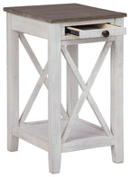 Accent table with drawer, open shelf, weathered white frame and dark gray top.