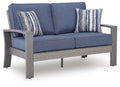 Blue-gray loveseat with gray base and two striped throw pillows