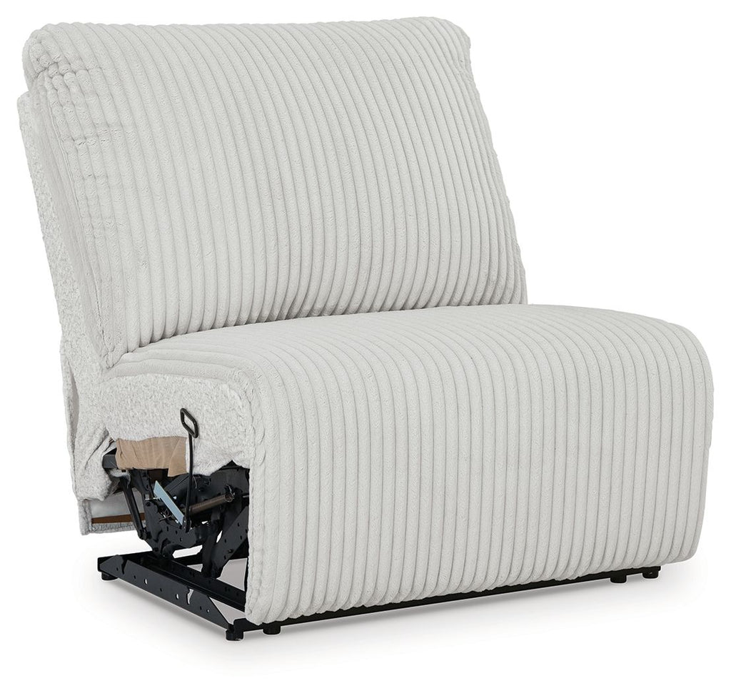 Light gray armless recliner chair with ribbed upholstery and visible reclining mechanism
