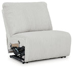 Light gray armless recliner chair with ribbed upholstery and visible reclining mechanism