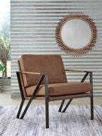 Caramel accent chair with square tufted back cushion and black metal support legs