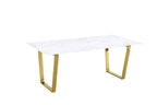 Marble-look dining table with white top and gold metal trestle legs