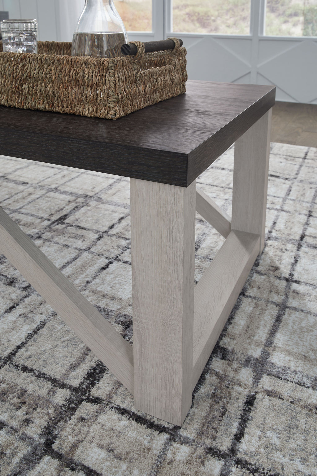 Square occasional table with dark brown top and antique white legs