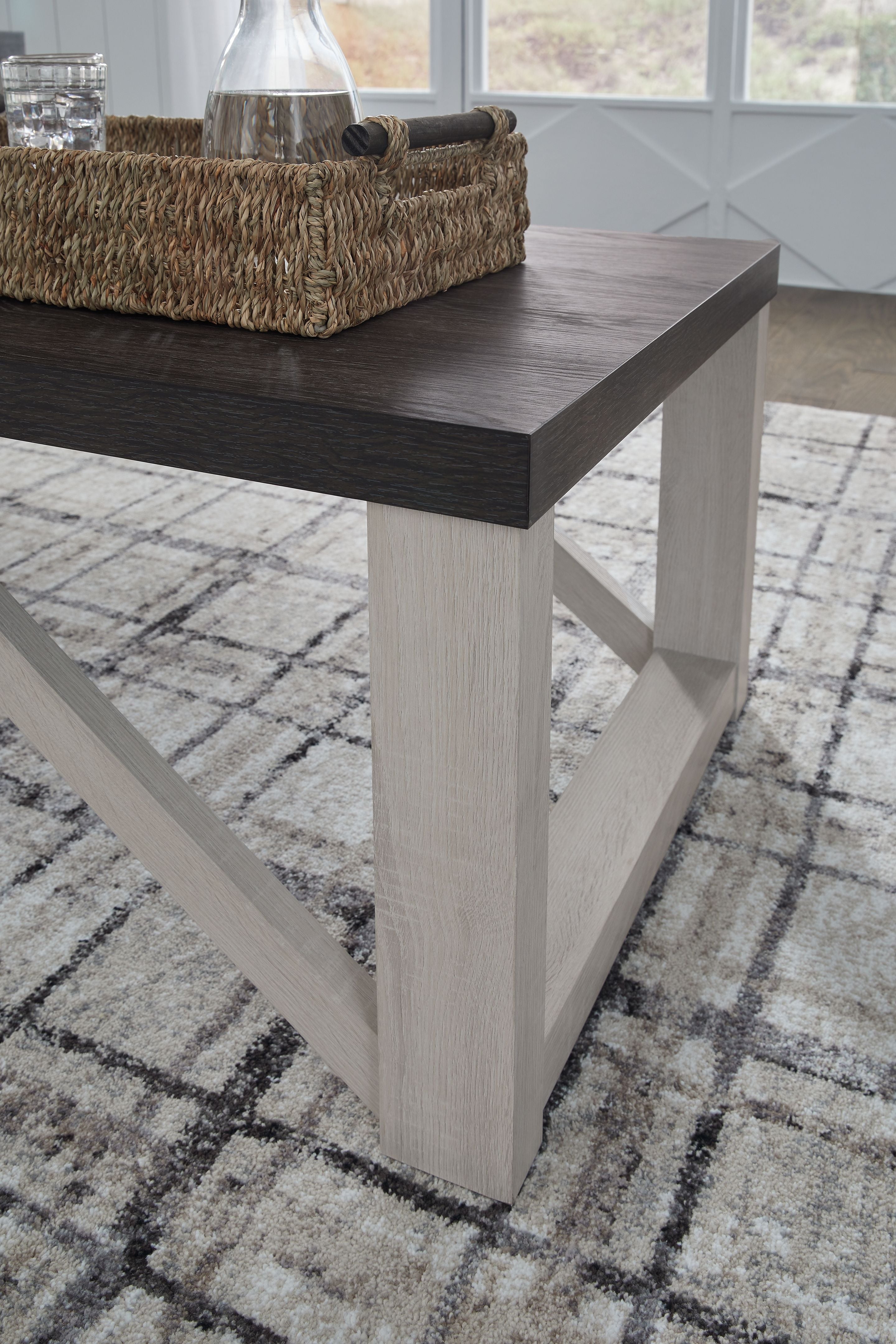 Square occasional table with dark brown top and antique white legs