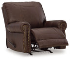 Dark brown leather-look rocker recliner with studded arms and extended footrest