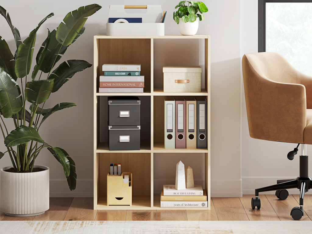 Light wood cube organizer with open cubby shelves and front framed compartments