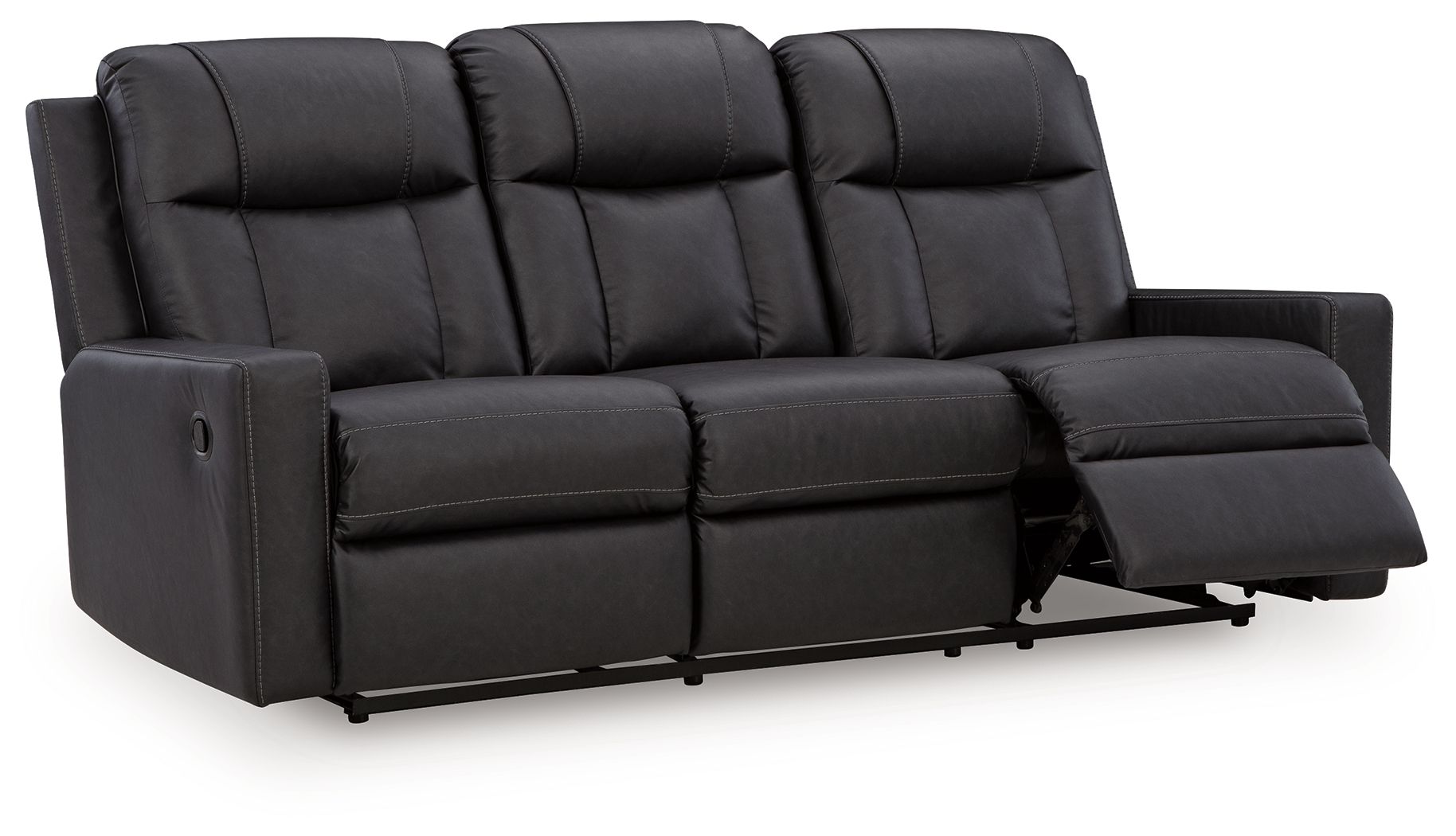 Black reclining sofa with pull-out footrest on the right and tufted seat cushions