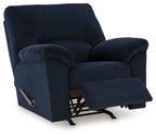 Navy striped rocker recliner chair with extended footrest and pull handle