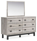 Gray dresser with mirror, six drawers with black bar pulls, wood-look finish