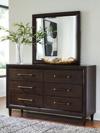 Dark brown dresser with mirror, six drawers, brass bar pulls