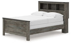 Gray bookcase panel bed with white mattress and open-shelf headboard, solid side rails.