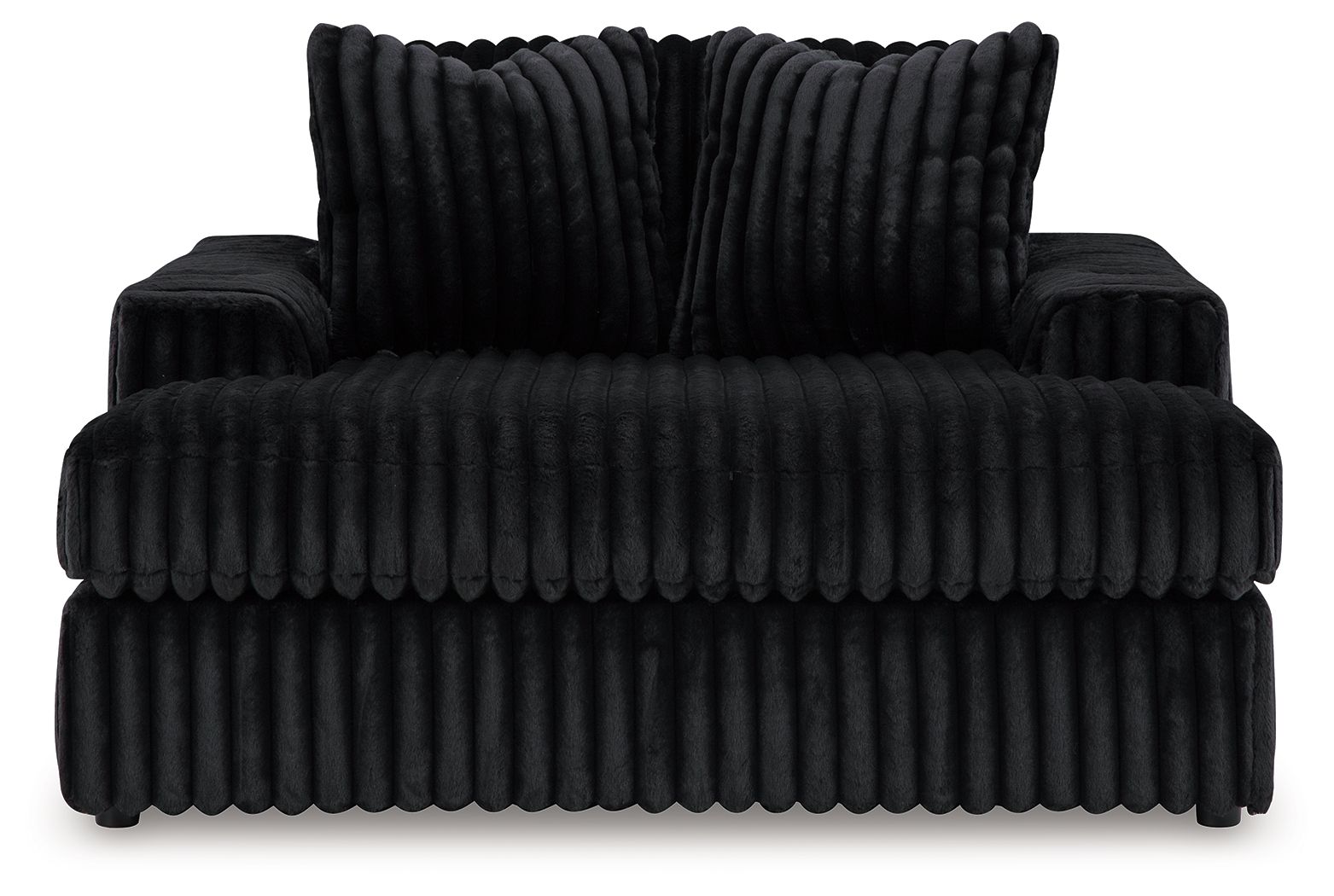 Oversized chaise with ribbed black fabric and deep seat; two back pillows included.