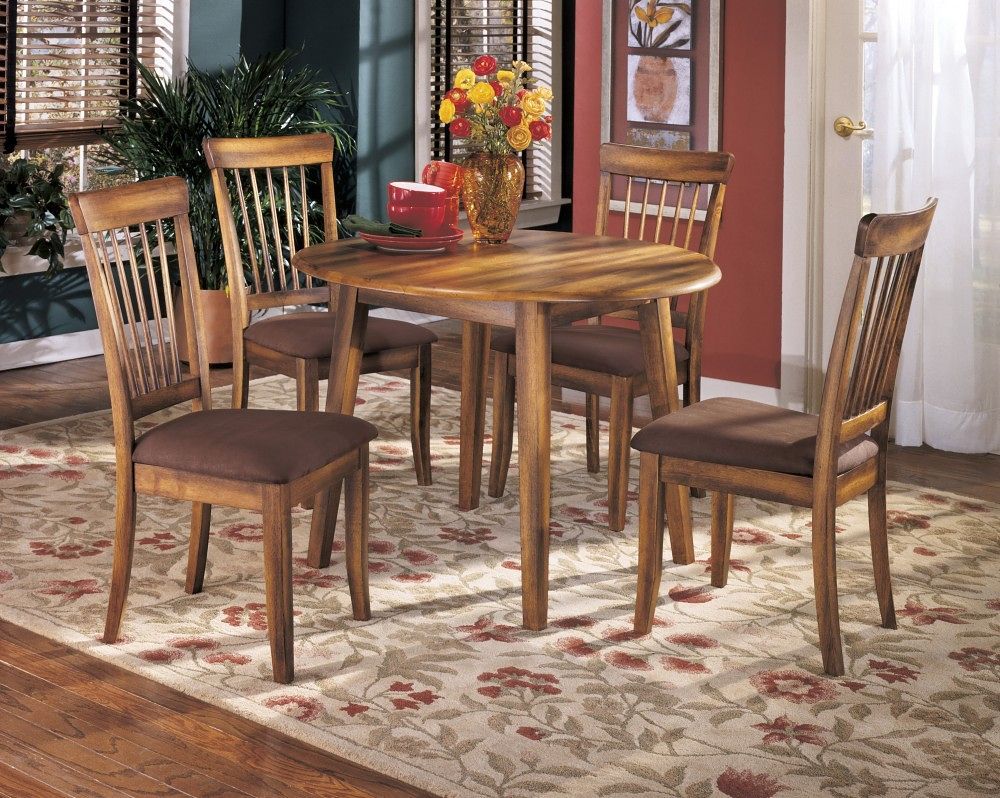 Drop leaf dining table set with dark brown table and four padded chairs