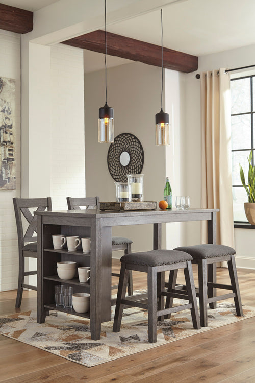 Gray rectangular counter table with matching gray upholstered barstools
