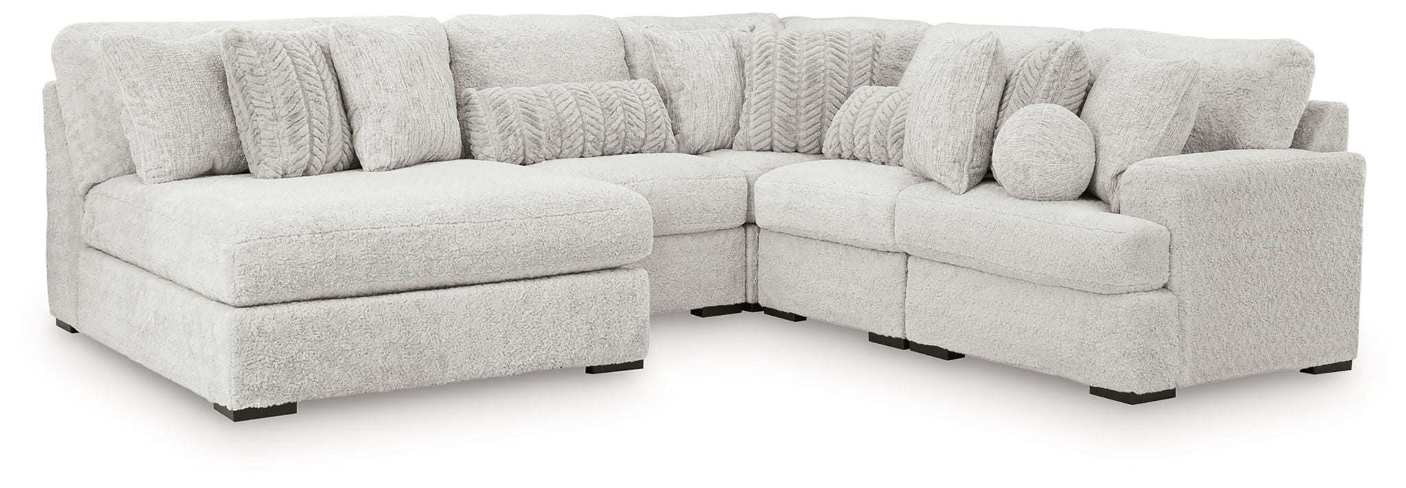 Light gray sectional sofa with corner seating and textured back cushions