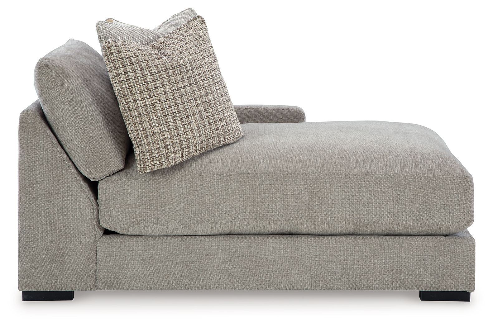 Pebble gray corner chaise with textured throw pillow on the arm