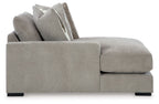 Pebble gray corner chaise with armrests, chaise cushion, and raised back pillows