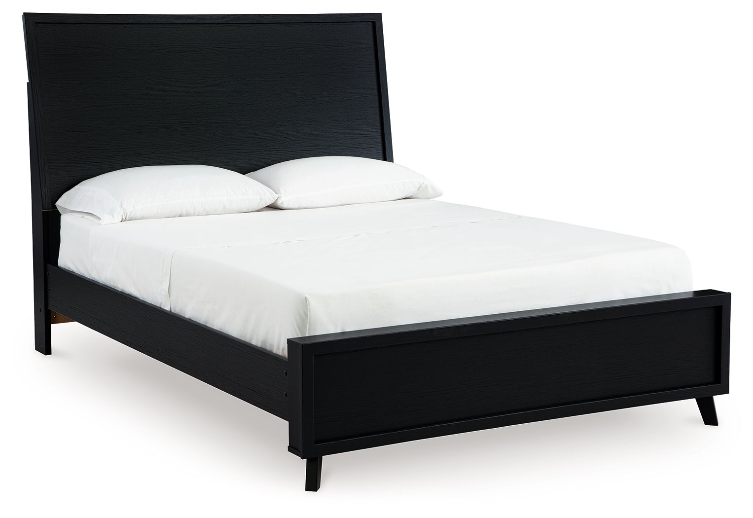 Black panel bed with upholstered headboard and footboard, white mattress and pillows
