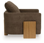 Brown accent chair side view with cushioned seat, high back, and wood accent plate