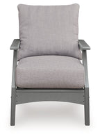 Gray lounge chair with square back cushion and padded seat cushion