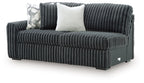 Ribbed corduroy sofa with left arm, gunmetal-gray upholstery and two throw pillows
