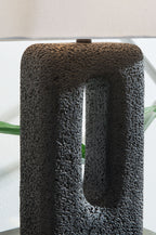 Black textured table lamp base with vertical oval cutout