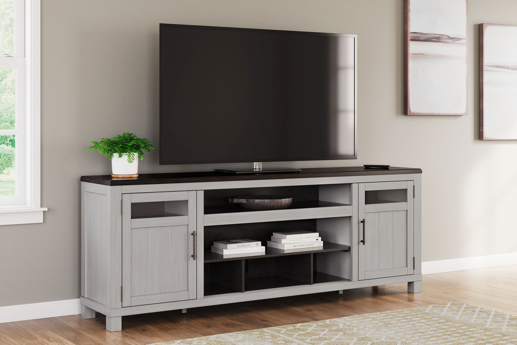 Gray TV stand with dark top, side cabinets and open middle storage for media