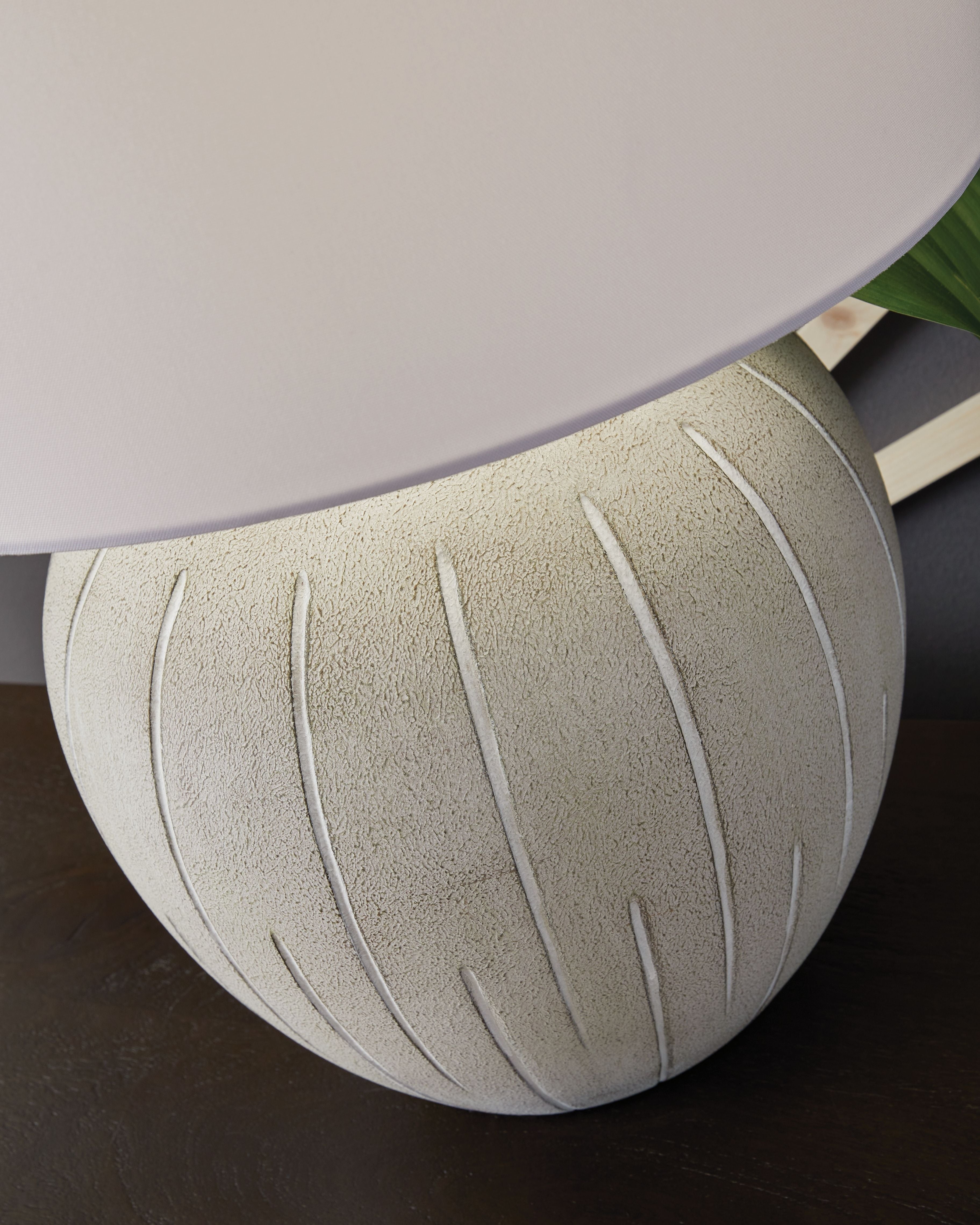 Warm gray ribbed poly lamp base with white drum shade edge