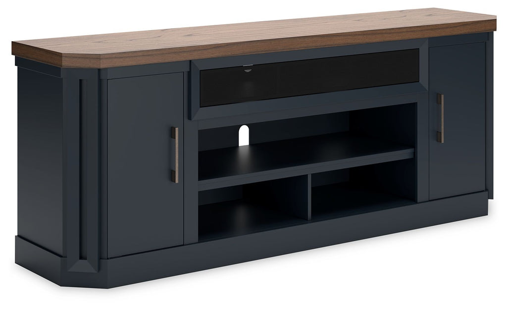 Dark blue TV stand with open shelves, fireplace-style insert, and wood top