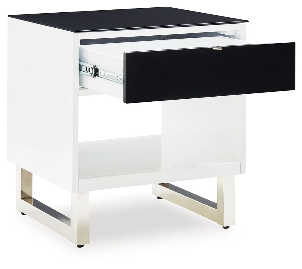 Rectangular end table with white frame and black drawer, top surface, open shelf, angled legs