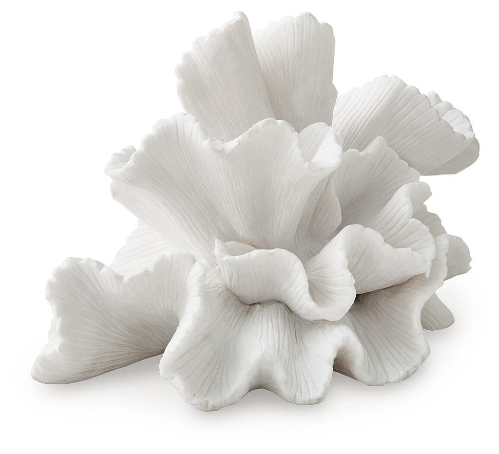 White layered flower sculpture with ruffled, fan-shaped petals