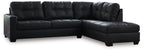 Dark charcoal sectional sofa with chaise corner, angled view