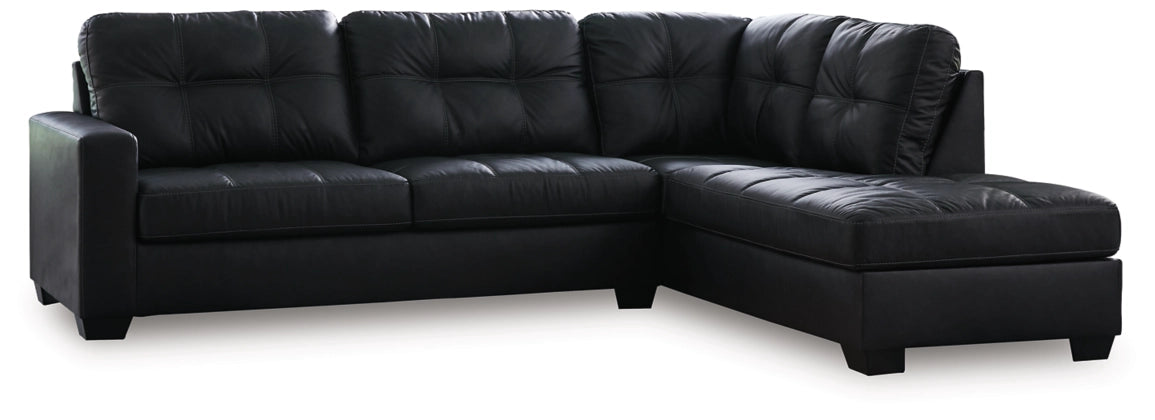 Dark charcoal sectional sofa with chaise corner, angled view