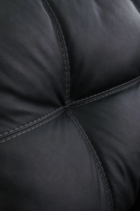 Dark charcoal cushion seam and stitching detail