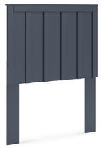Blue panel headboard with vertical slats and flat top rail