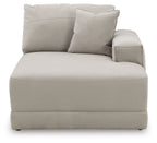 Gray upholstered corner chaise with thick seat cushion and large accent pillow