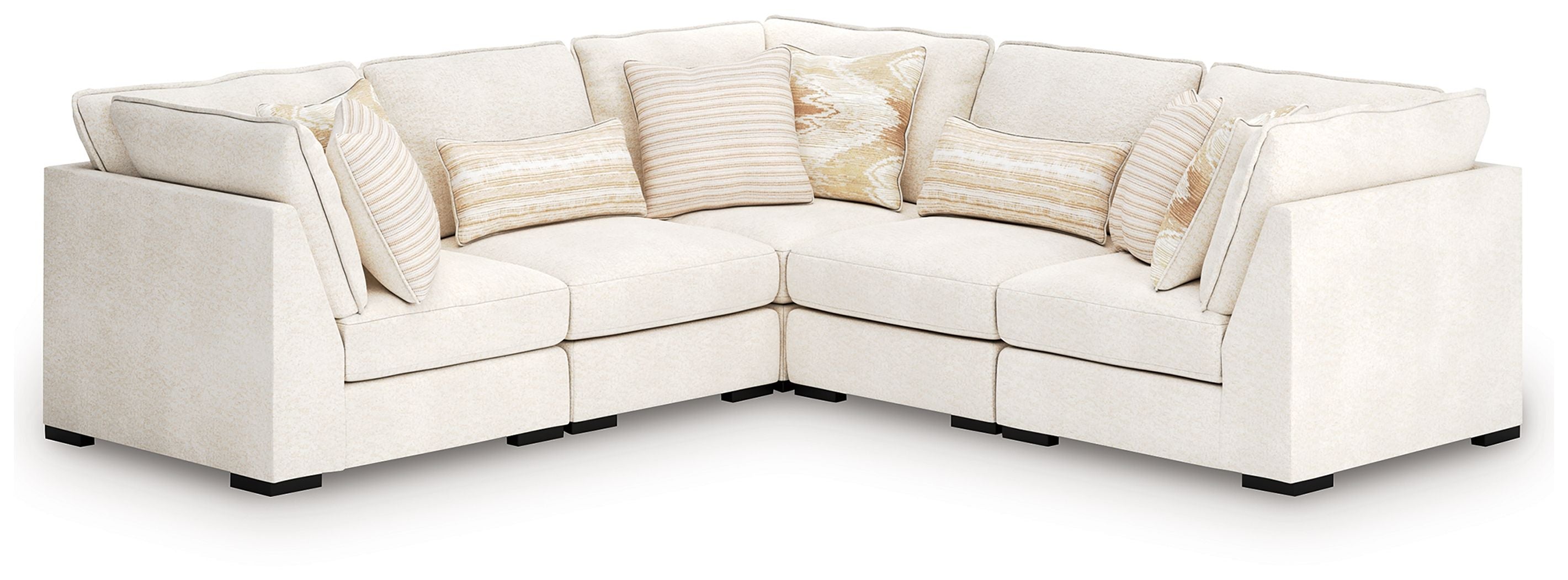 Vanilla sectional sofa with rounded arms, corner chaise, and quilted back pillows
