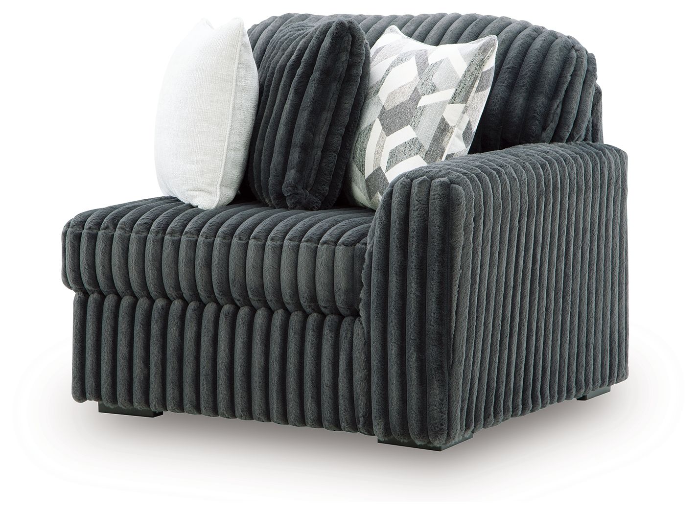Gunmetal corduroy corner chair with dark side arm and patterned throw pillow