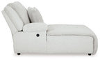 Light gray press-back power chaise with cushioned backrest and rounded padded arm panel.