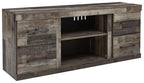 Gray TV console with two drawers and open center bay with vented fireplace opening