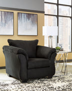 Dark charcoal arm chair with rolled arms, deep seat, and square back cushion