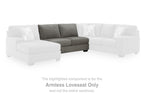 Gray armless loveseat with boxy arms and low, rectangular seat cushions