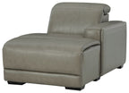 Gray reclining back power chaise chair with padded armrest and visible side panel stitching