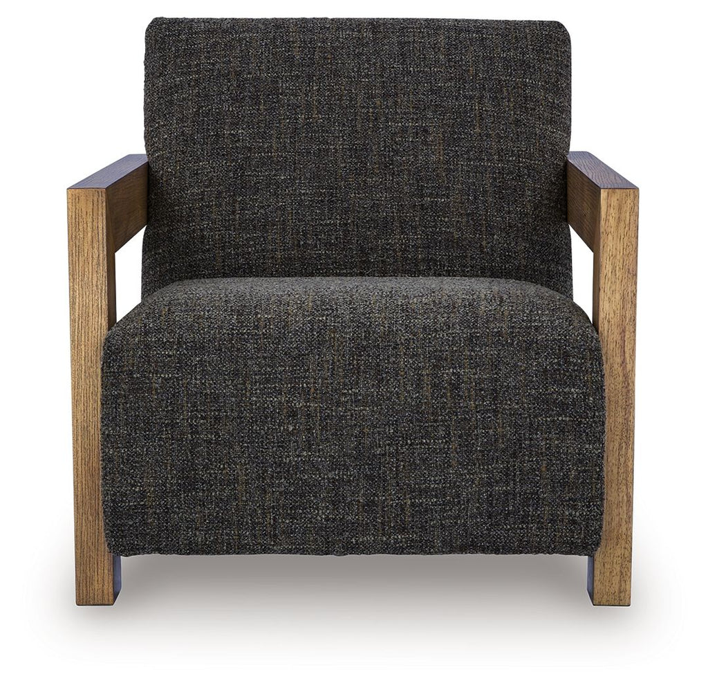 Charcoal upholstered accent chair with tall back, armrests, and wooden legs