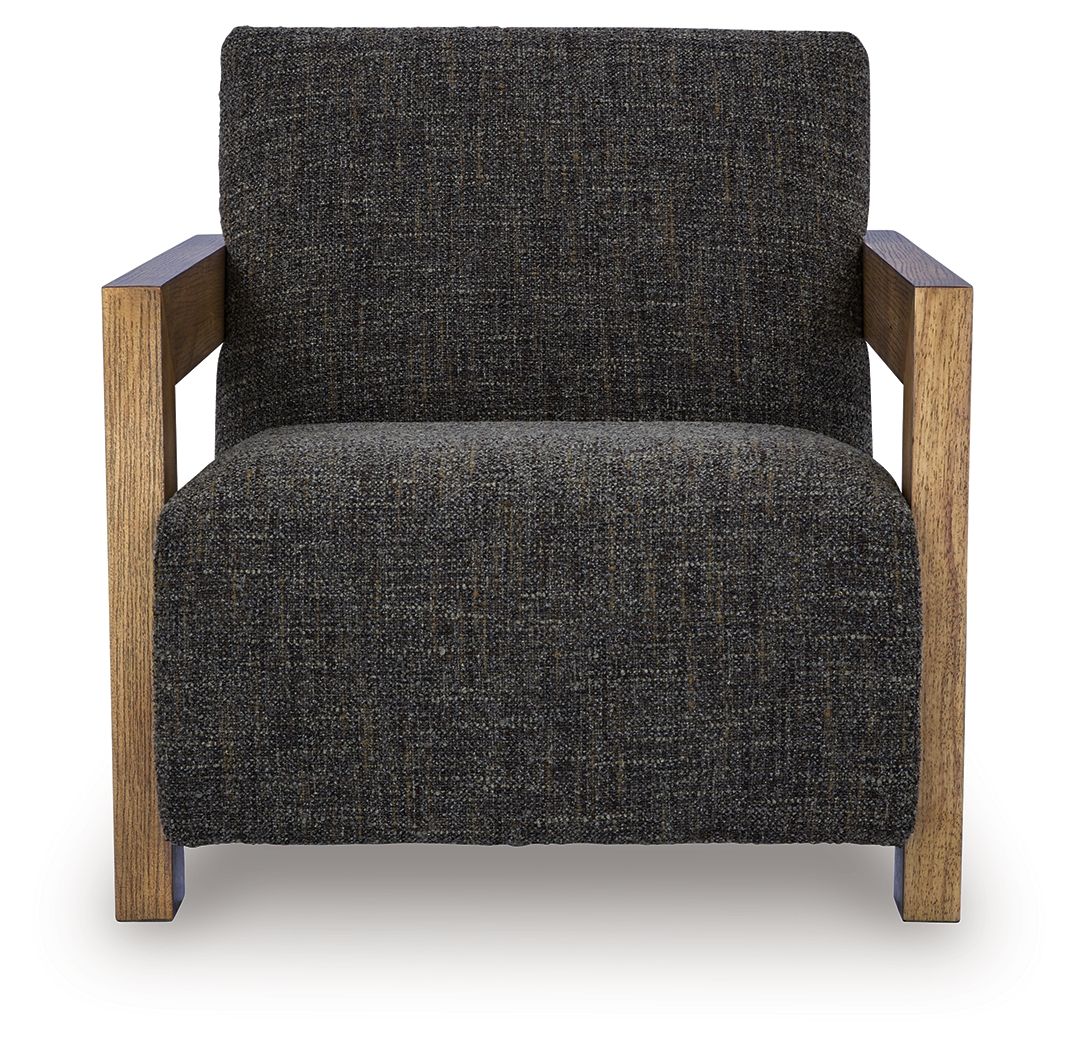 Charcoal upholstered accent chair with tall back, armrests, and wooden legs