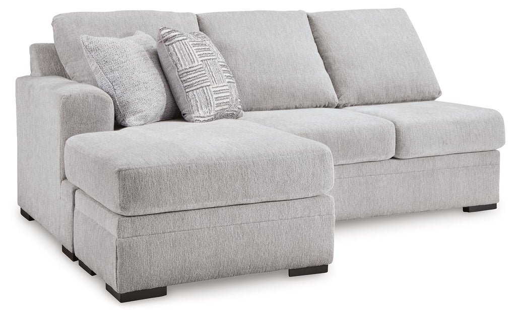 Light gray fabric sofa chaise with chaise ottoman and two back cushions