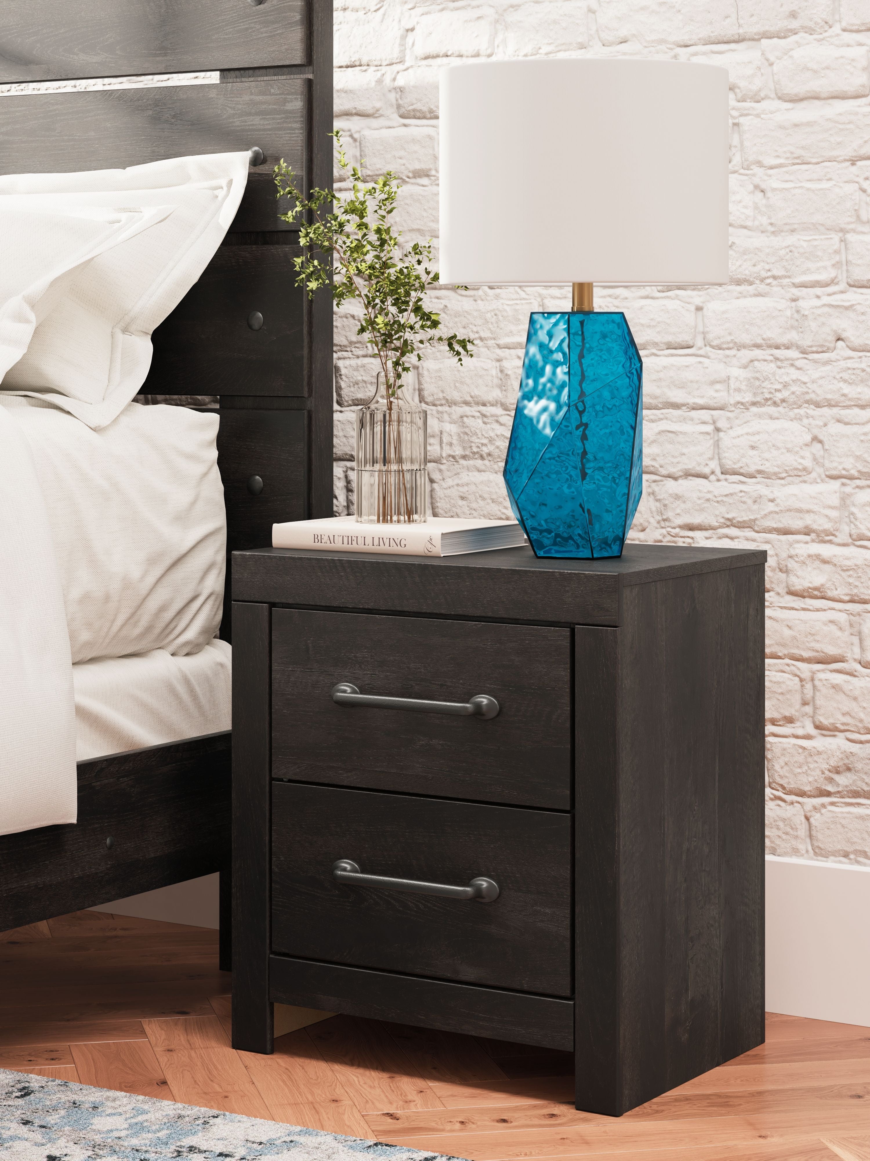 Two-drawer nightstand in dark gray with two drawers and metal bar pulls